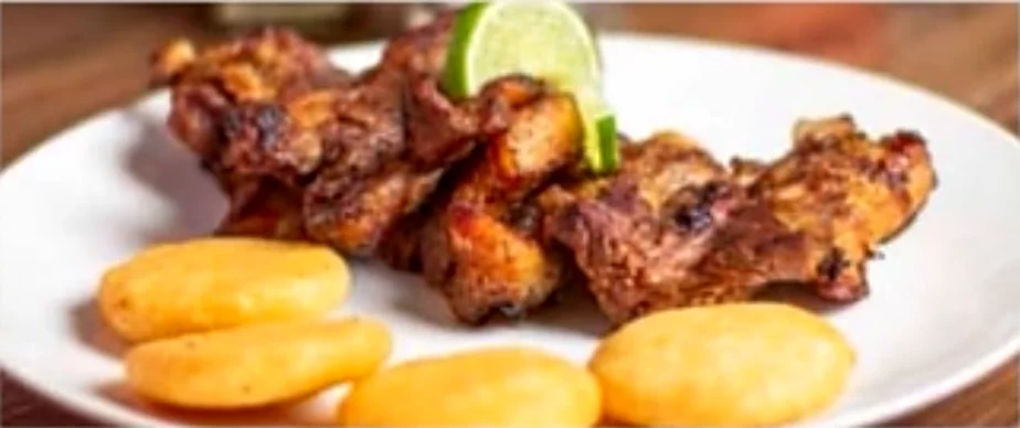 Costillas al limón con arepitas